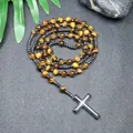 Detailed macro view of natural tiger eye stone beads and polished hematite cross - Tiger Eye Style 2