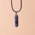 Hexagonal blue stone crystal pendant necklace with black cord - Sodalite