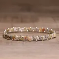 Close-up of pink handmade beaded elastic bracelet with stone chips and gold beads - Style 1