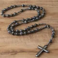 Macro view of natural labradorite round beads and polished hematite cross pendant rosary - Labradorite Cross Style / Larvikite