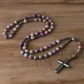 Close-up view of a natural stone bead rosary necklace with a hematite cross pendant - Purple Stone Cross Style / Deep purple