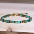 Handmade TILA bead bracelet featuring aqua and gold geometric tiles, bohemian style - Cyan Gold Dark Green Geometric Style (19)