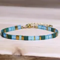Handmade TILA bead bracelet with blue and green geometric glass beads and gold spacers - Blue Green Gold Geometric Style (20)