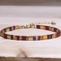Handmade TILA bead bracelet with natural red and orange stones in a chic geometric design - Red Orange Gold Geometric Style (16)