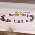 Handmade TILA bead bracelet featuring a geometric pattern of purple pink and gold tones - Purple Pink Gold Brown Geometric Style (18)