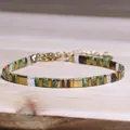 Handmade Tila bead bracelet featuring green natural stones and gold geometric spacers. - Emerald Green Color-Blocked Geometric Style (25)
