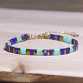 Handmade bohemian TILA bead bracelet featuring blue natural stones and gold spacers - Lake Blue Geometric Color-Blocked Style (26)