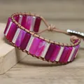 Macro detail of hand-woven wrap bracelet with rose red agate cylindrical beads on wood surface - Rose Red Agate
