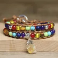 Close-up of bohemian wrap bracelet with colorful stone beads and raw citrine pendant - Citrine Raw Stone Style (Golden Yellow) / Triple Layer Wrap / Gold