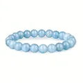 Detailed close-up view of 8mm light blue natural healing stone beaded elastic bracelet - 8 mm / Aquamarine