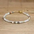 Close-up of faceted natural African turquoise stone beads on an adjustable jewelry piece. - Light Blue