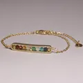 Detailed view of a minimalist gold-plated bracelet featuring multi-colored natural gemstone beads - Rainbow Eight Color Beads