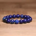 Detailed macro view showing the texture of 8mm blue natural stone beaded bracelet - Lapis Lazuli