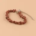 Bracelet en éclats de pierre marron avec chaîne d'extension argentée. - Grès Doré