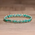 Handmade elastic beaded bracelet featuring turquoise stones and gold beads - Light Green Imperial Stone