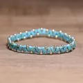 Stylish handmade turquoise and gold beaded elastic bracelet for men and women - Round Turquoise with Black Veins