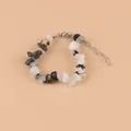 Bracelet artisanal en pierres naturelles concassées avec fermoir mousqueton réglable - Quartz Rutilé Noir