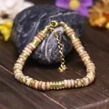 Bracciale regolabile in perle di pietra naturale con accenti in acciaio dorato - Diaspro Paesaggio