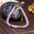Elegante bracciale di perle in pietra naturale viola con dettagli in acciaio dorato - Fosfosiderite