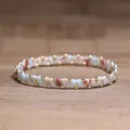 Elegant handmade beaded elastic bracelet featuring natural stone and gold-tone beads - Shoushan Stone