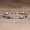 Handmade blue and white natural stone beaded elastic bracelet with gold accents - Blue Spot Stone