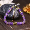 Elegante bracciale regolabile con pietre viola e perle in acciaio inox dorato da donna - Giada Viola Lavanda