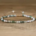 Detailed macro view of 4mm faceted moss agate beads on an adjustable handmade bracelet. - 4mm Faceted Style / Agate