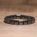 Macro view of minimalist geometric hematite bead elastic bracelet on a wooden surface - Square Curved Minimalist Style (#25)