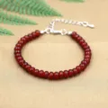 Elegant natural red carnelian beaded bracelet featuring an adjustable silver lobster clasp - Red Plastic Beads