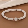 Elegant natural white crystal gemstone bracelet with silver spacer beads detail - White Jade