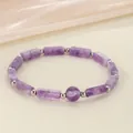 Detailed view of natural amethyst gemstone bracelet with rectangular and round beads. - Amethyst