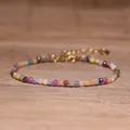 Close-up detail of a colorful natural tourmaline faceted bead bracelet with gold clasp - Colorful Tourmaline Style (#3)
