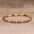 Boho handgemaakte armband van gefacetteerde natuursteen met verstelbare gouden ketting - Gefacetteerde Kralen (Verstelbaar) / Oranje Granaat