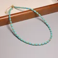 Collier vintage en perles de verre turquoise avec accents dorés et chaîne ajustable - Style Perles Cylindriques Bleu-Vert (XL0110)
