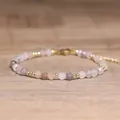 Handgemaakte bohemian armband met gefacetteerde roze natuursteen en gouden kralen - Gefacetteerde Kralen (Verstelbaar) / Violet