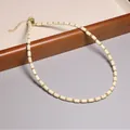Collier ras-du-cou élégant avec perles cylindriques crème et touches dorées pour femme - Style Perles Cylindriques Blanc Crème (XL0109)