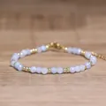 Bracelet bohème fait main ajustable avec perles facettées bleu clair et dorées - Perles Facettées (Ajustable) / Aigue-marine