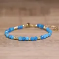 Bracelet bohème en pierres naturelles bleues facettées avec chaîne dorée ajustable - Perles Facettées (Ajustable) / Style Apatite