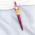 Red Christmas beaded ballpoint pen featuring a cute gnome and vibrant orange bead - Santa Claus Style (2-Red Barrel)