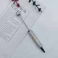 Elegant ballpoint pen with full AB rhinestone finish on white card background - White