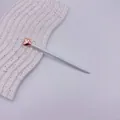 Elegant light blue ballpoint pen featuring a decorative rose gold heart top design - Rose Gold Accessories / White