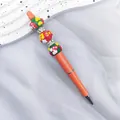 Christmas themed beaded ballpoint pen with orange glitter barrel and colorful hand-painted beads - Pearlescent Orange-Floral (Zhishi Culture Christmas Magic Wand) / 1.0mm Bullet Tip