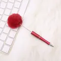 Cute red metal ballpoint pen featuring a large fluffy faux fur pom-pom top decoration. - Red