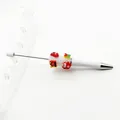 White Christmas-themed beaded ballpoint pen with festive sugar-effect frosted beads - White