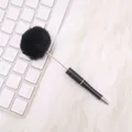 Adorable minimalist ballpoint pen featuring a soft black faux fur pom-pom topper - Black