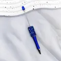 Blue DIY beadable pen with sparkling resin rhinestones on white fabric backdrop - Klein Blue