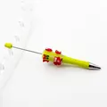 Vibrant green Christmas-themed DIY beaded ballpoint pen with decorative snowflake glitter - Bright yellow
