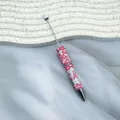 Creative ballpoint pen decorated with pink and white cream glue art design - White