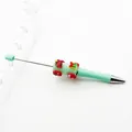 Christmas themed DIY beaded ballpoint pen with mint green body and sugar texture detail - Light Green