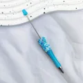 Light blue DIY beaded ballpoint pen featuring sparkling star and moon sequins. - 1.0mm Bullet Tip / New Macaron Blue